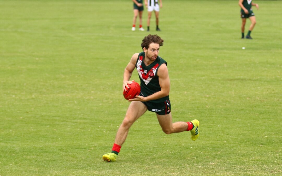 Tuck re-signs with Woods