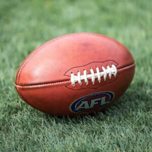 AFL football on grass